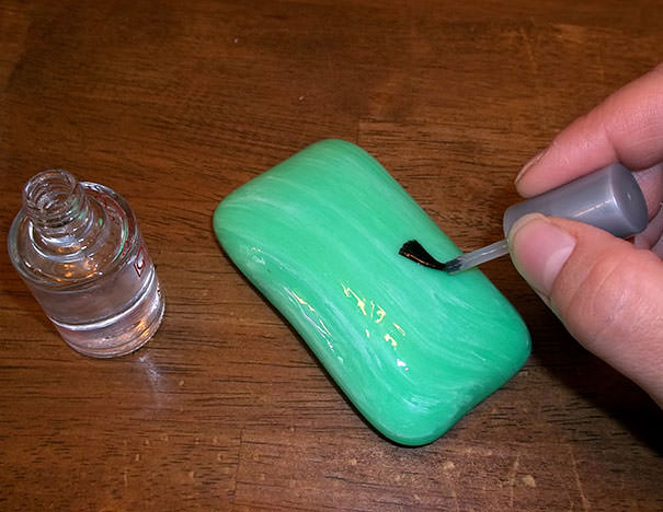 Paint a bar of soap with clear nail polish